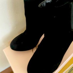 Never worn. Sexy ankle boots